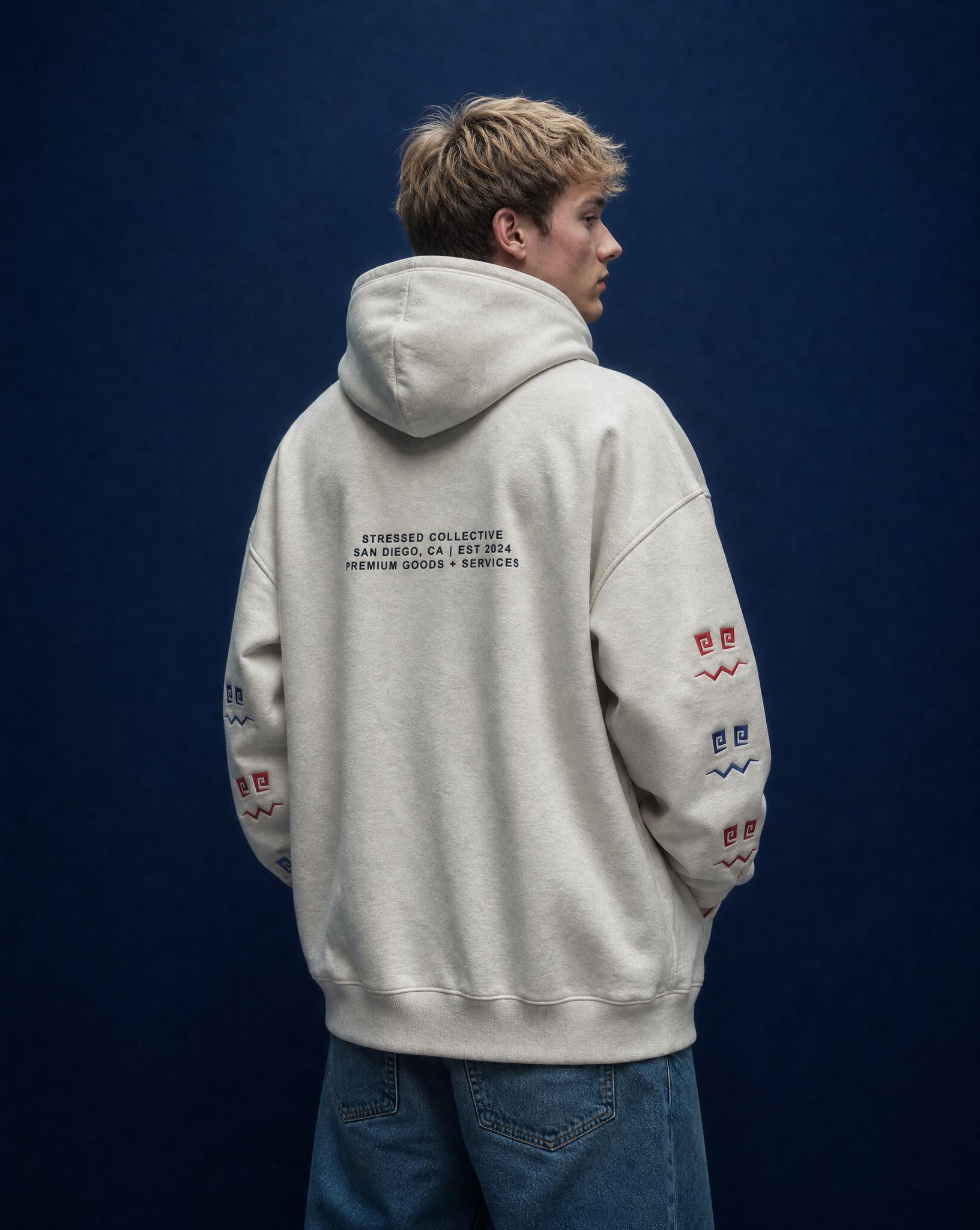 Emroided Repeating Face Sleeve Snap Hoodie PODpartner