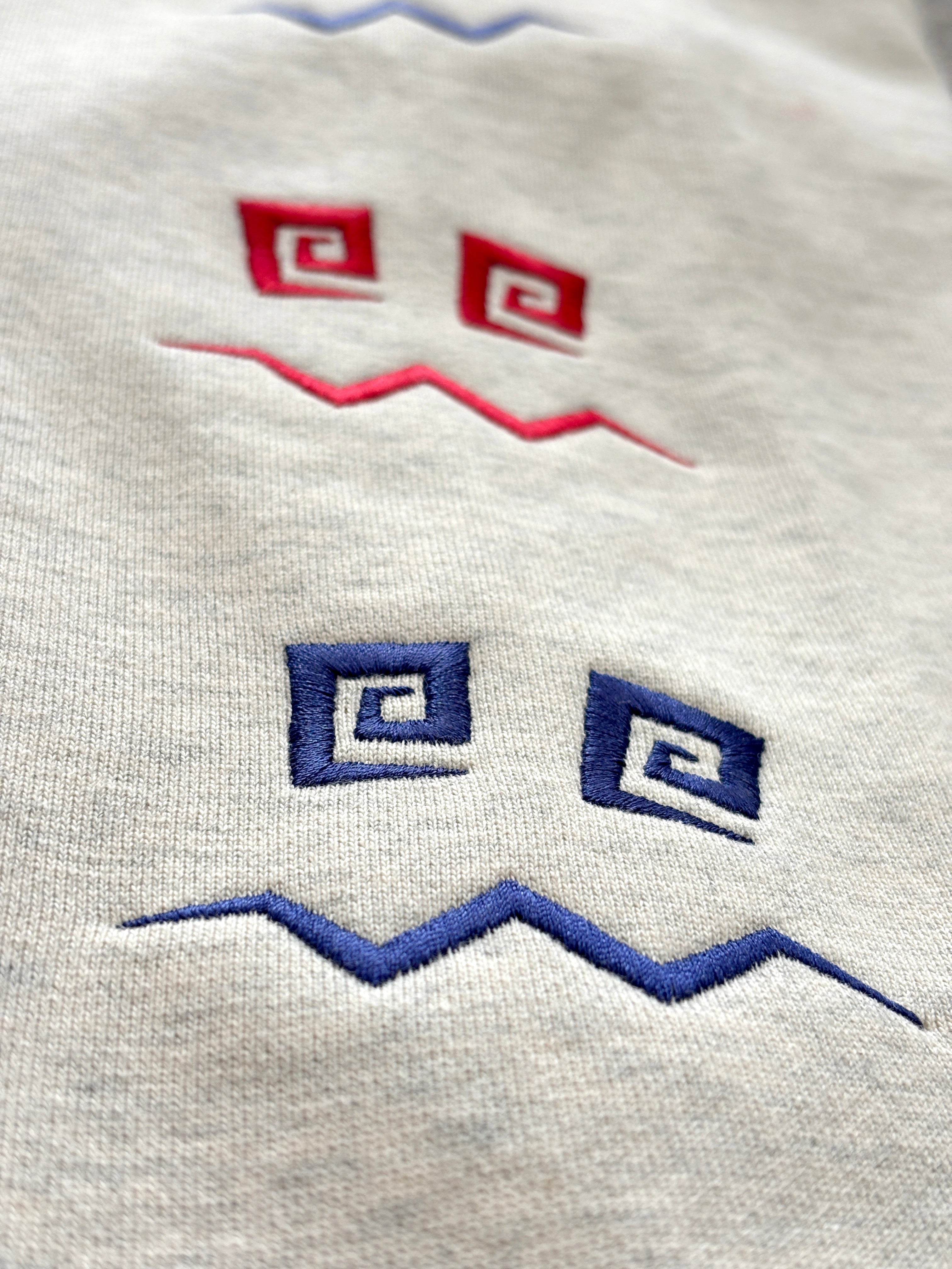 Emroided Repeating Face Sleeve Snap Hoodie PODpartner